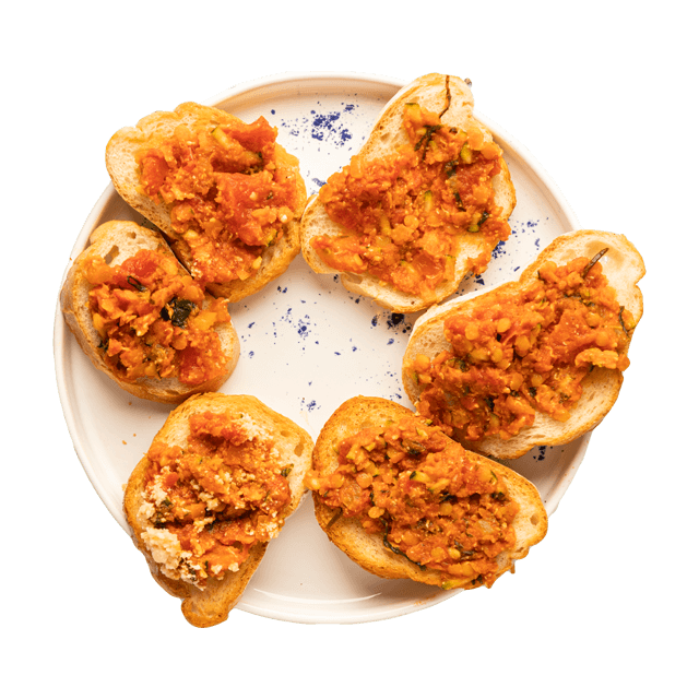 Bruschetta z soczewicą, świeżymi ziołami i serem grana padano