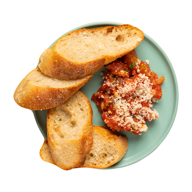 Bruschetta z pomidorami, świeżymi ziołami i serem grana padano