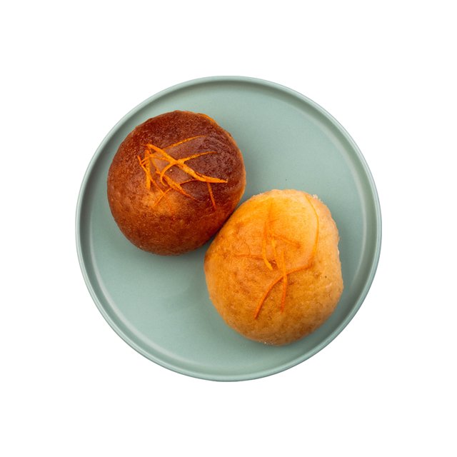 Pieczone pączki z lukrem i skórką pomarańczową